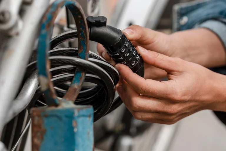 Bicycle Lockout Services: Woman putting bike lock